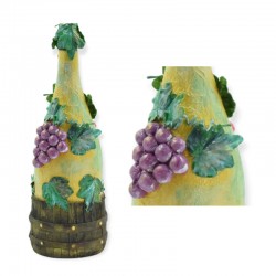 (Champane like) Bottle with grapes and a barrel